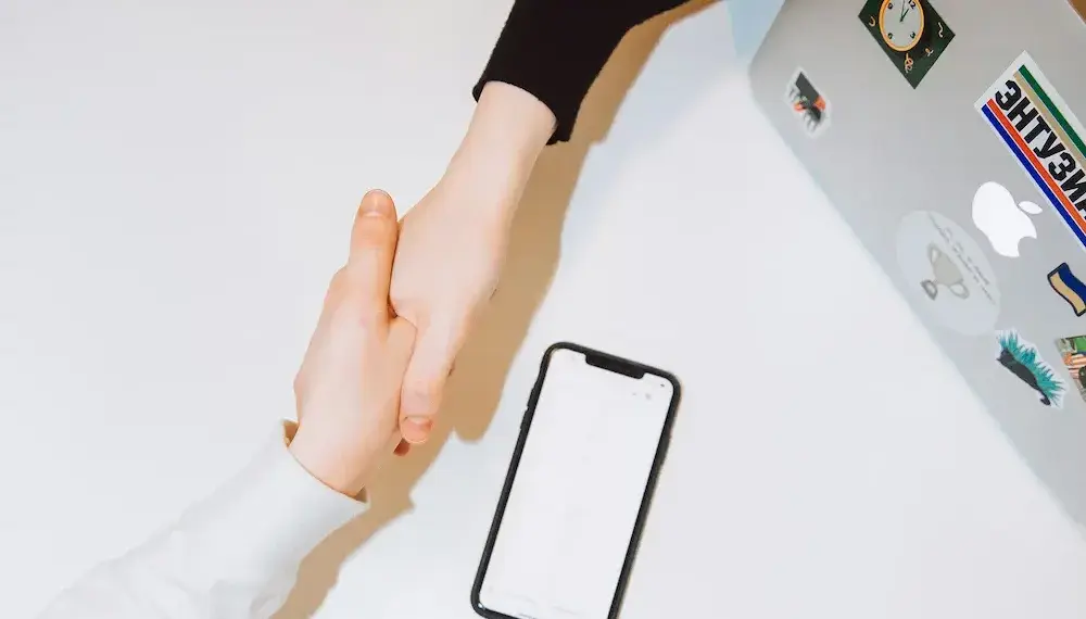 Foto VivaLand Homepage Erfolg Hand reichen einig